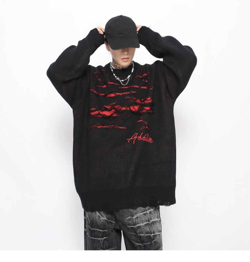 Derbundy - Oversized trui met ronde hals en distressed letters