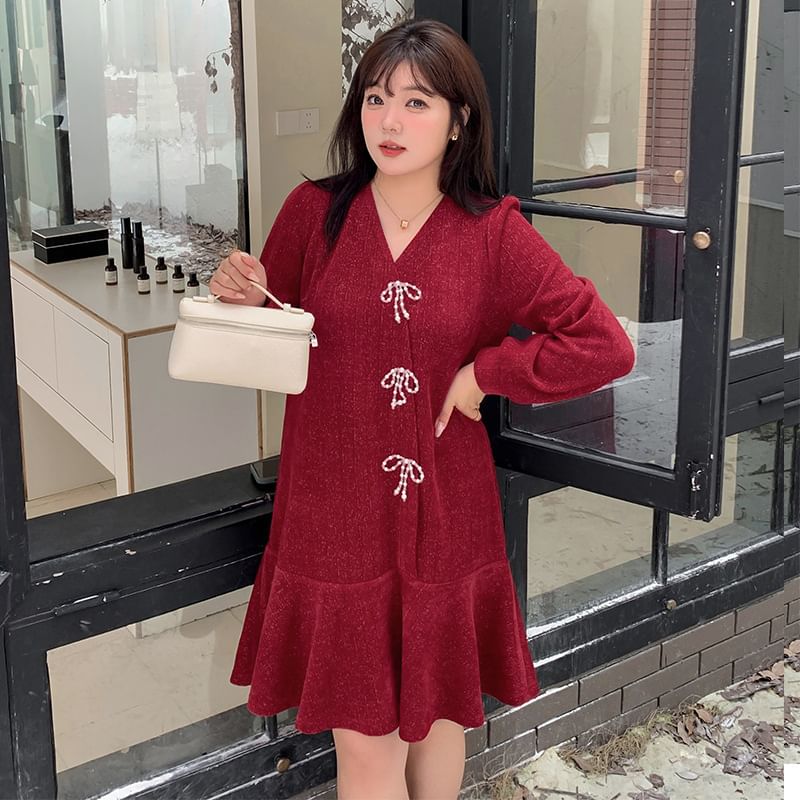 Tripoly - Plus-size lange mouwen V-hals glitter strik smockjurk