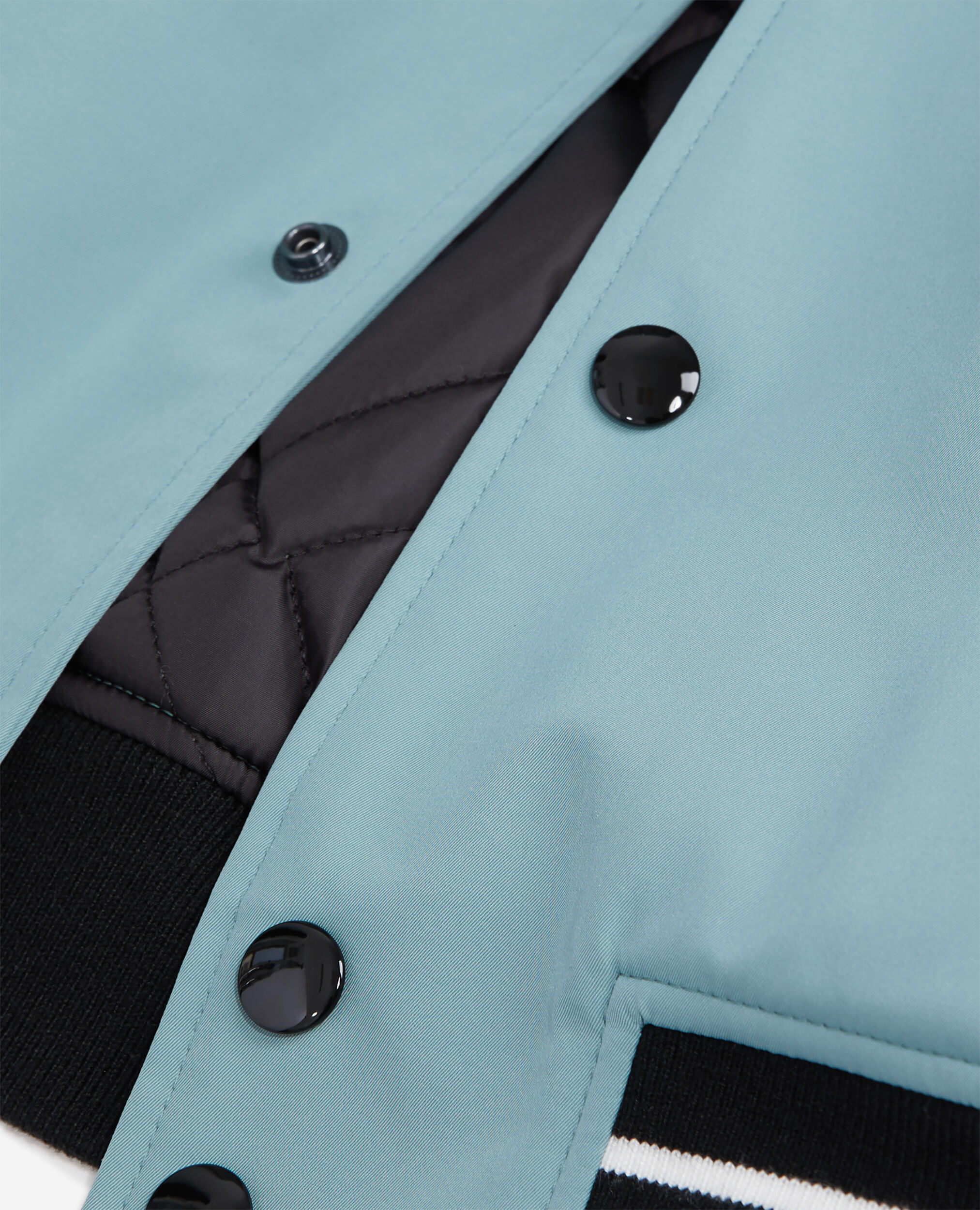Blouson bleu et vert avec patchwork