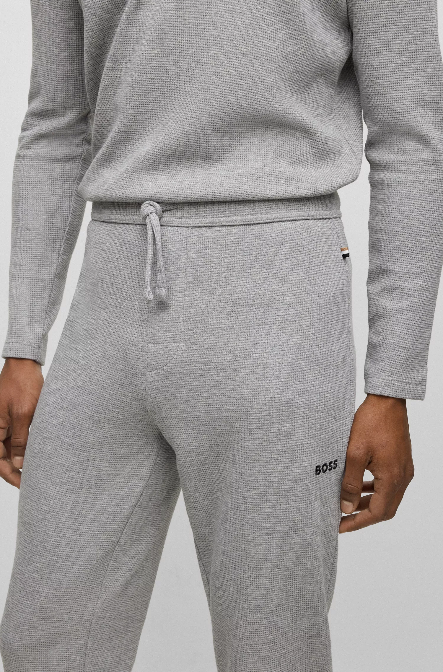 Calça de pijama BOSS em mistura de algodão preto com logotipo bordado.