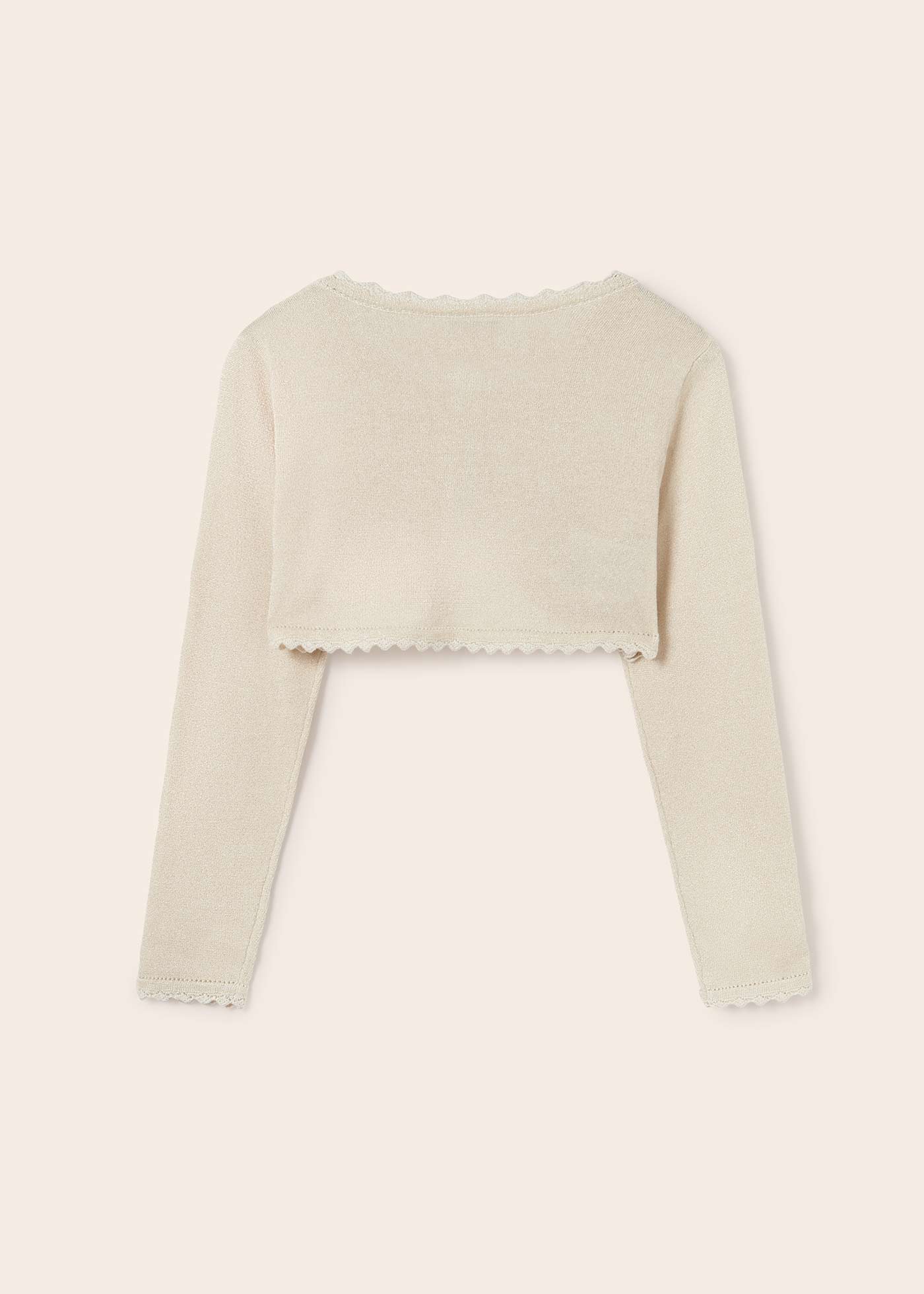 Casaquinho estilo bolero feito com algodão sustentável para meninas