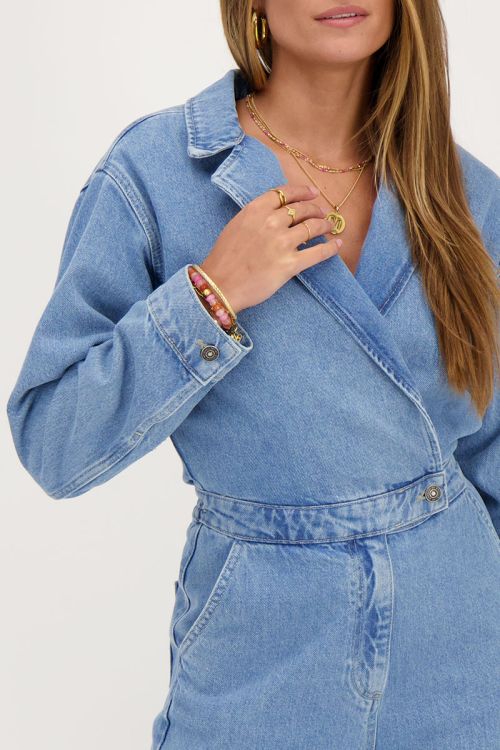 Blauwe denim jumpsuit met reverskraag