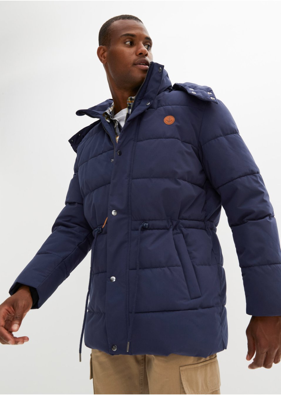 Gewatteerde jas met afneembare capuchon en tunnelkoord van gerecycled polyester