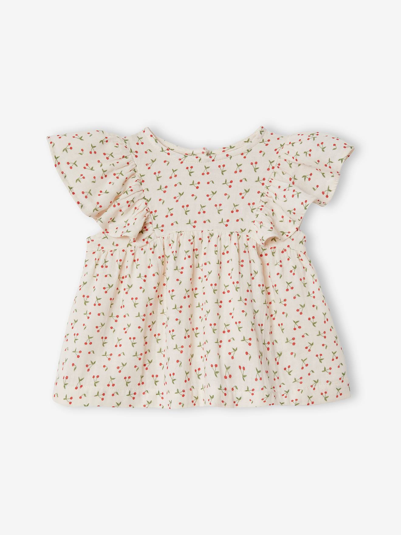 Blusa infantil azul acinzentada com babados.