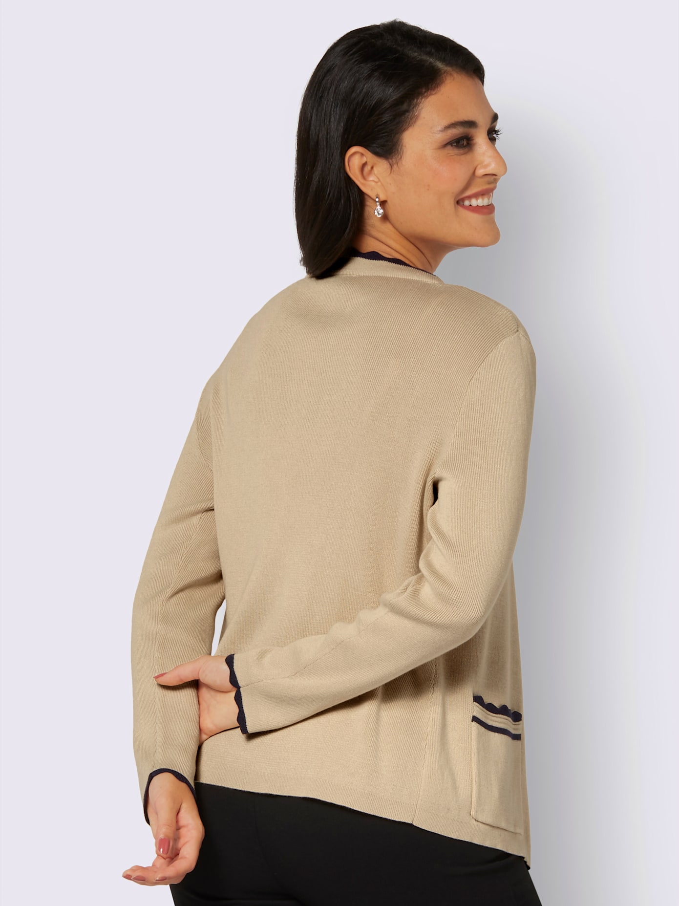 Veste en tricot bords ondulés contrastés