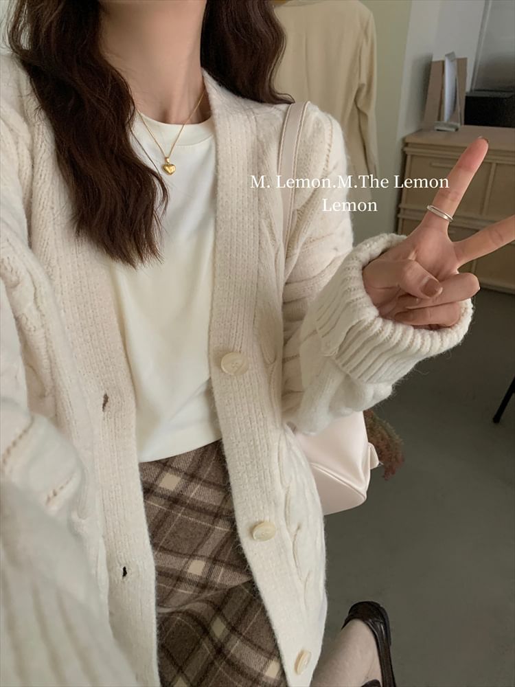 Doromynn - Oversized vest met V-hals en kabelmotief