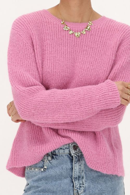 Roze gebreide trui met strikken