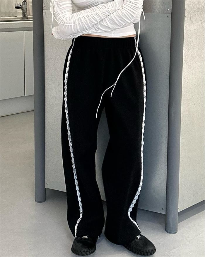 PINPI - Elastische taille, kanten rand en wijde pijpen joggingbroek