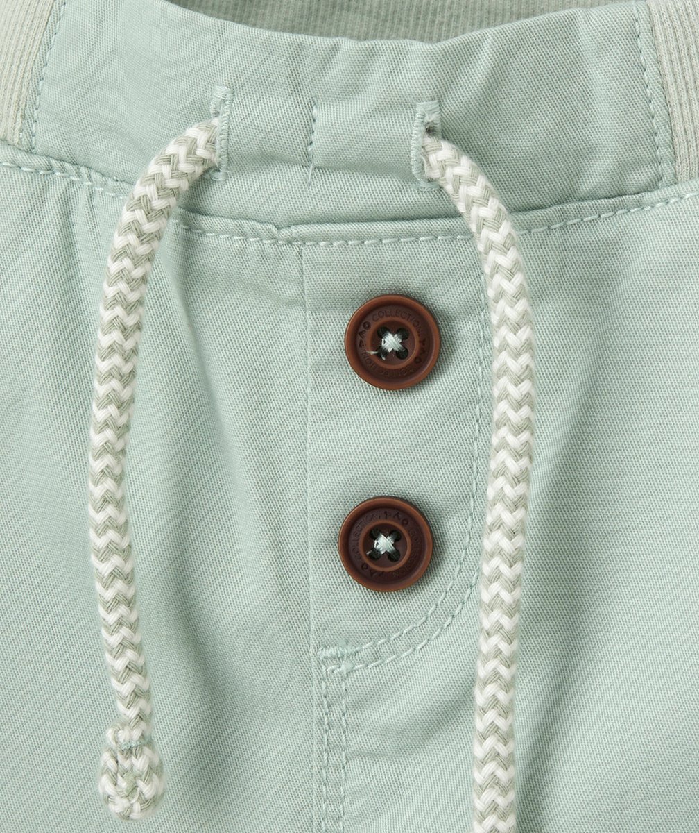 LE PANTALON SAROUEL VERT EN TOILE DE COTON