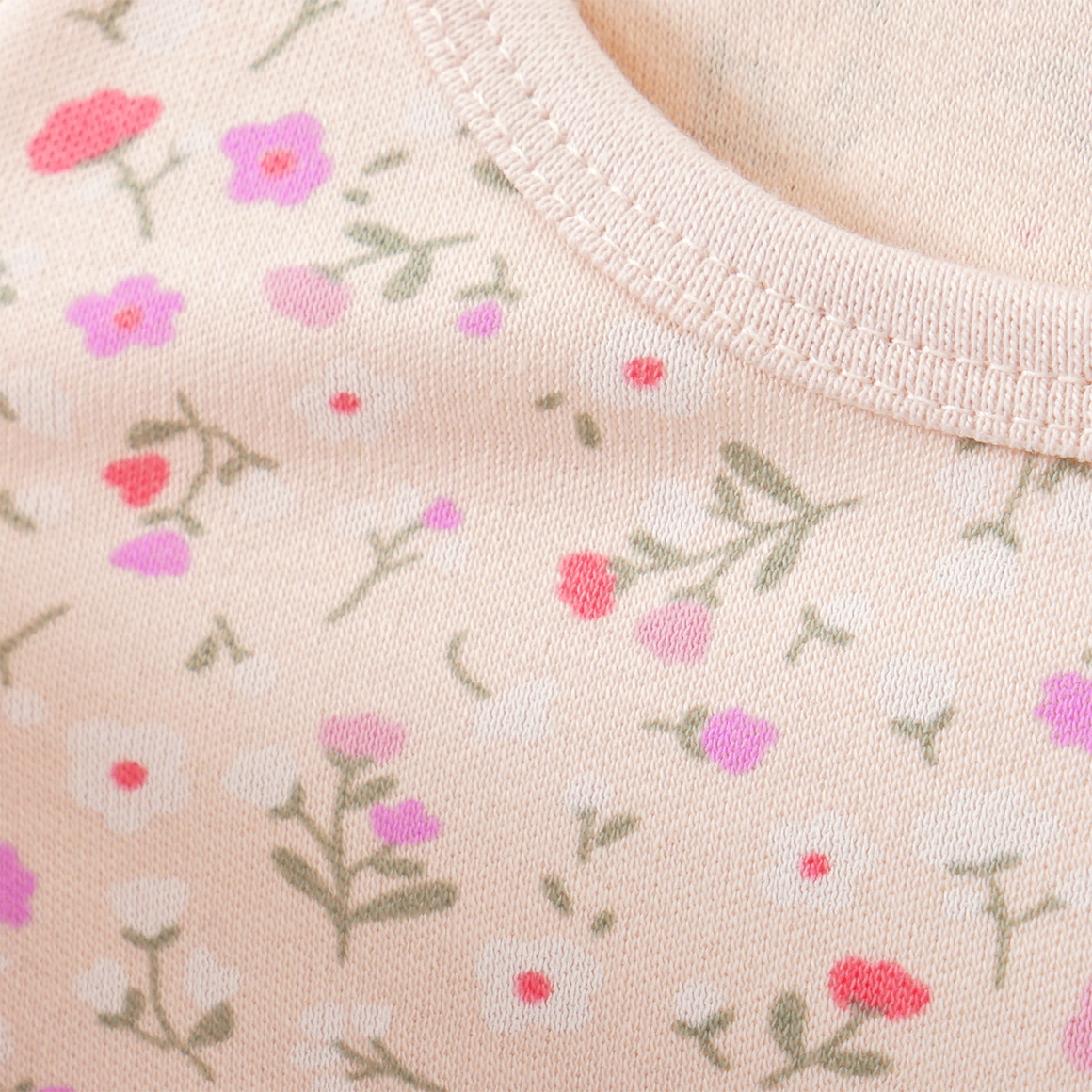 Topomini Baby Schlafanzug aus Bio-Baumwolle creme / flieder