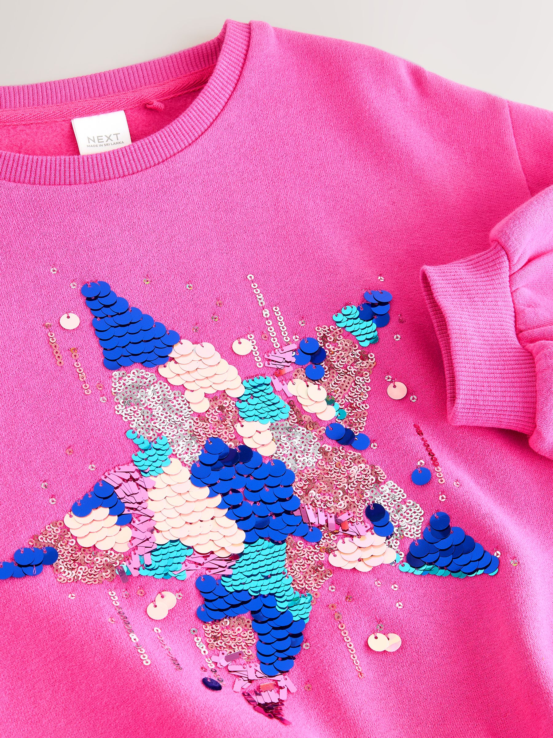 Felroze met lovertjesster - Sweatshirt (3 - 16 jr)