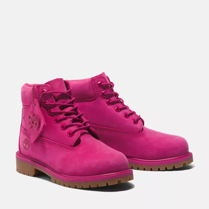 Bota Timberland Premium de 6 polegadas impermeável, edição especial 50, para crianças, na cor rosa escuro.