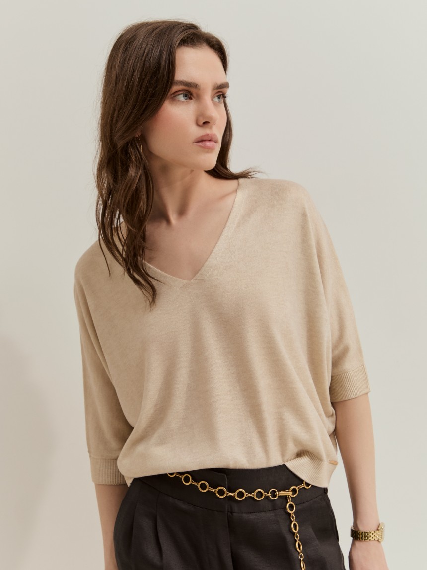 Camisola de malha dourada