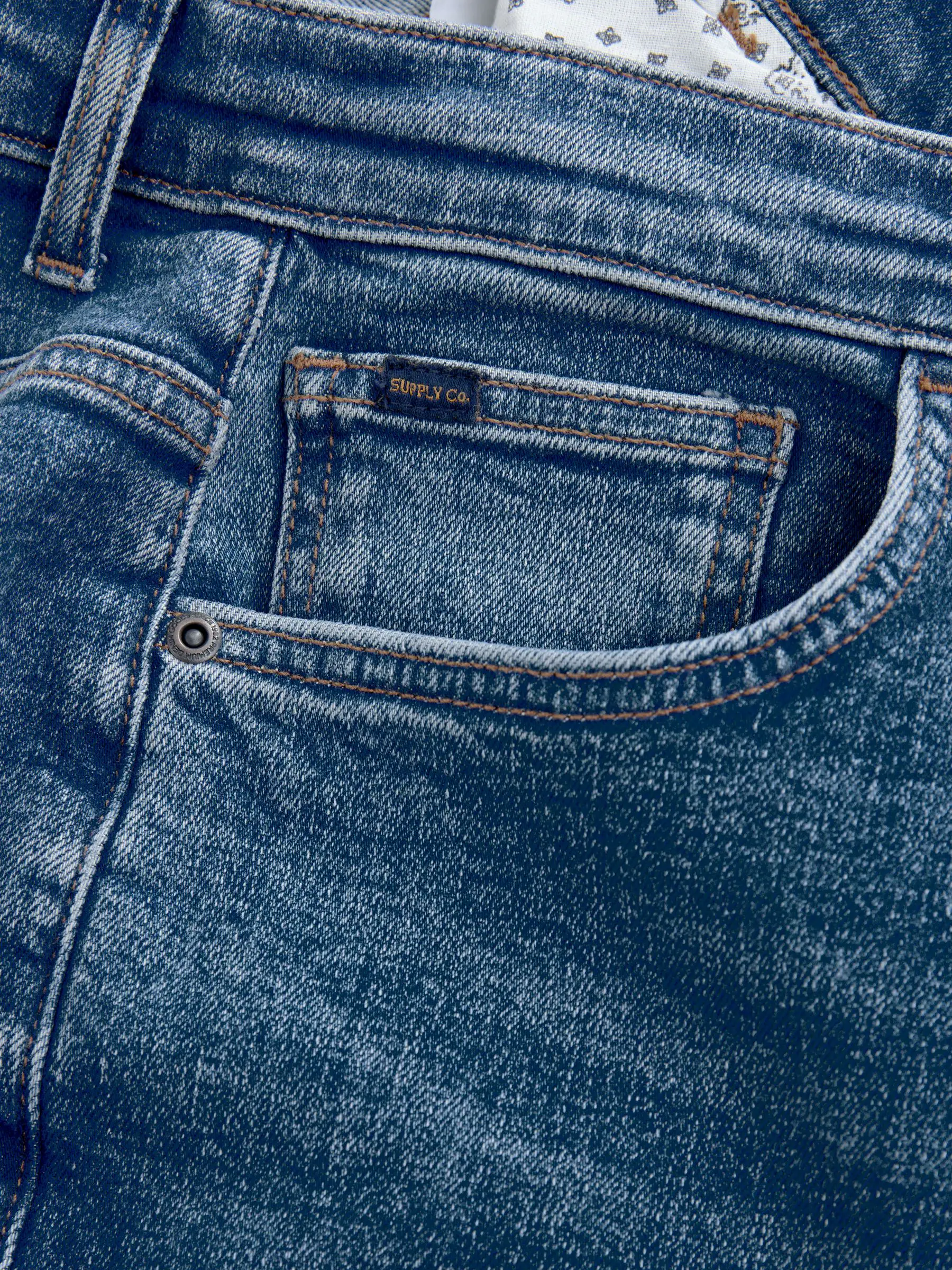Mediumblauw - Standaard toelopende pasvorm - Vintage wash denim jeans