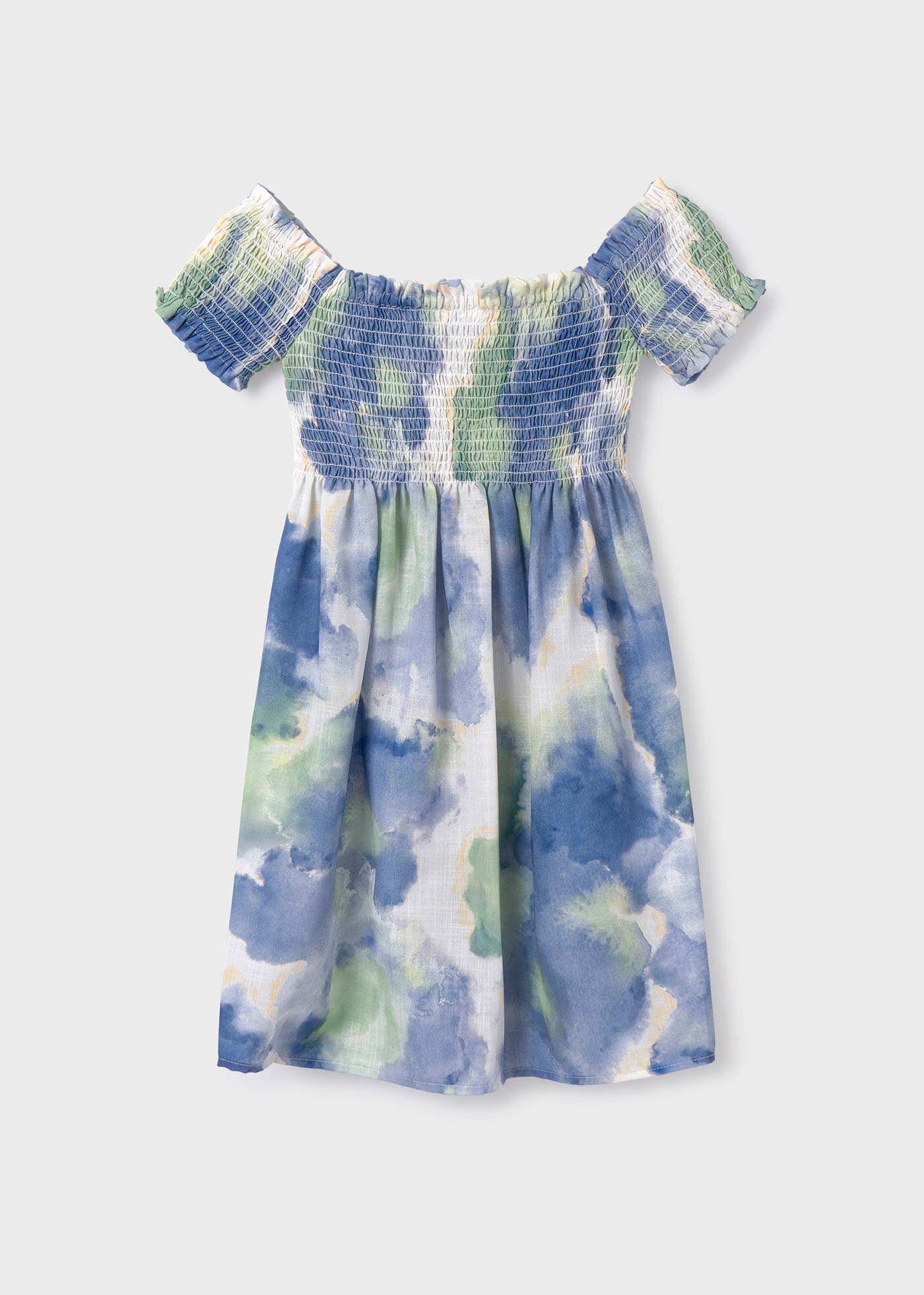 Vestido infantil com estampa de bolinhas e detalhes franzidos.