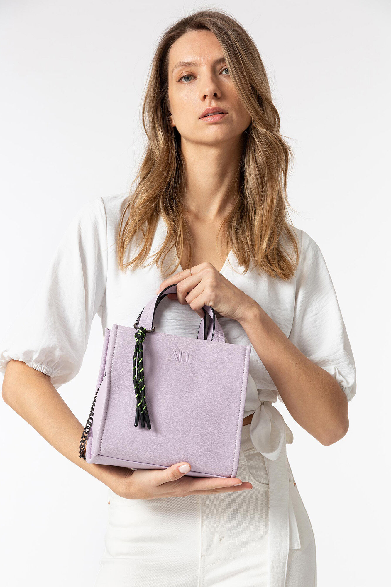 Bolsa urbana rosa contrastante
