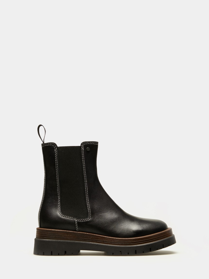 Botins chelsea em pele
