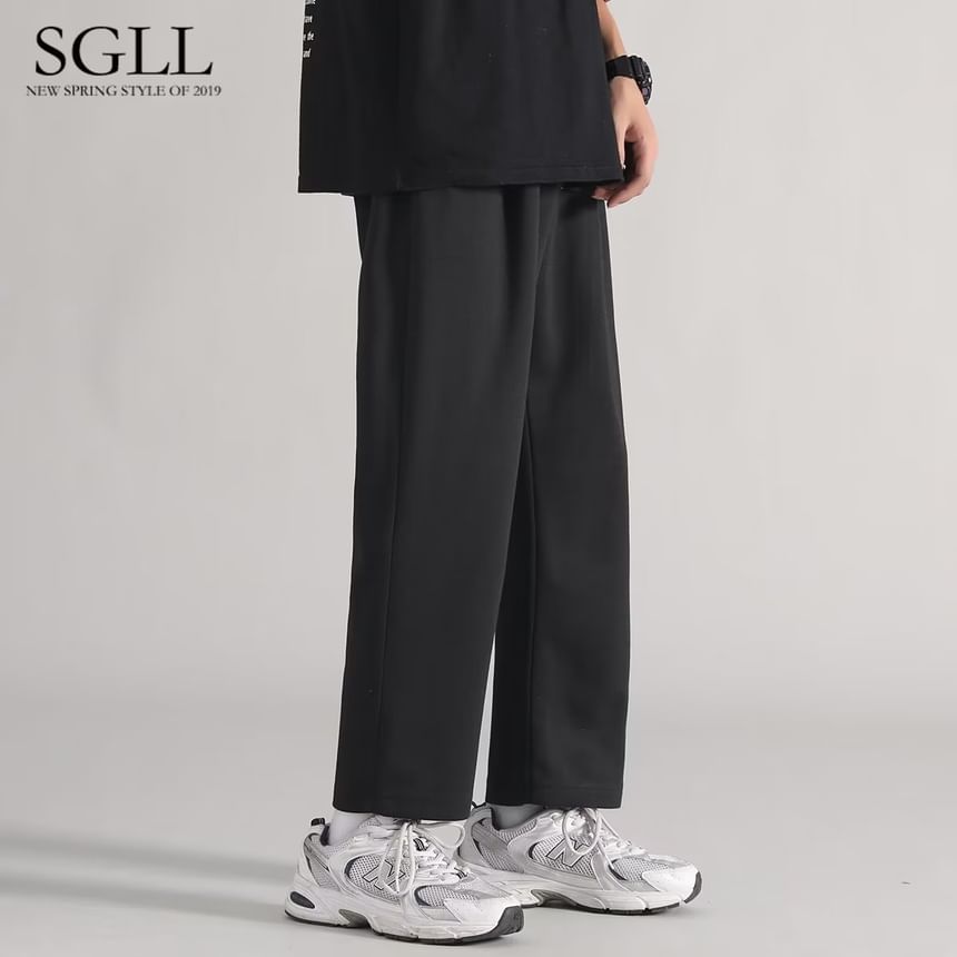 Jozev - Effen cropped rechte joggingbroek met trekkoord in de taille