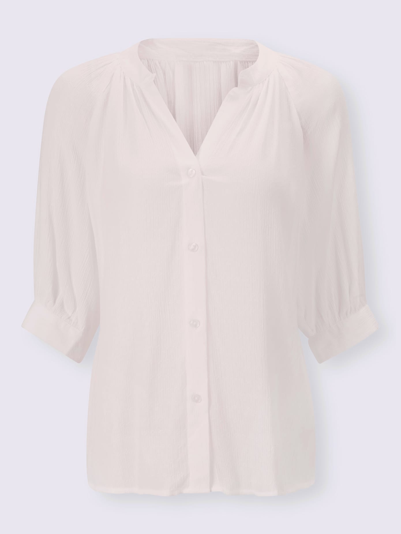 Chemisier look tendance avec ourlet arrondi