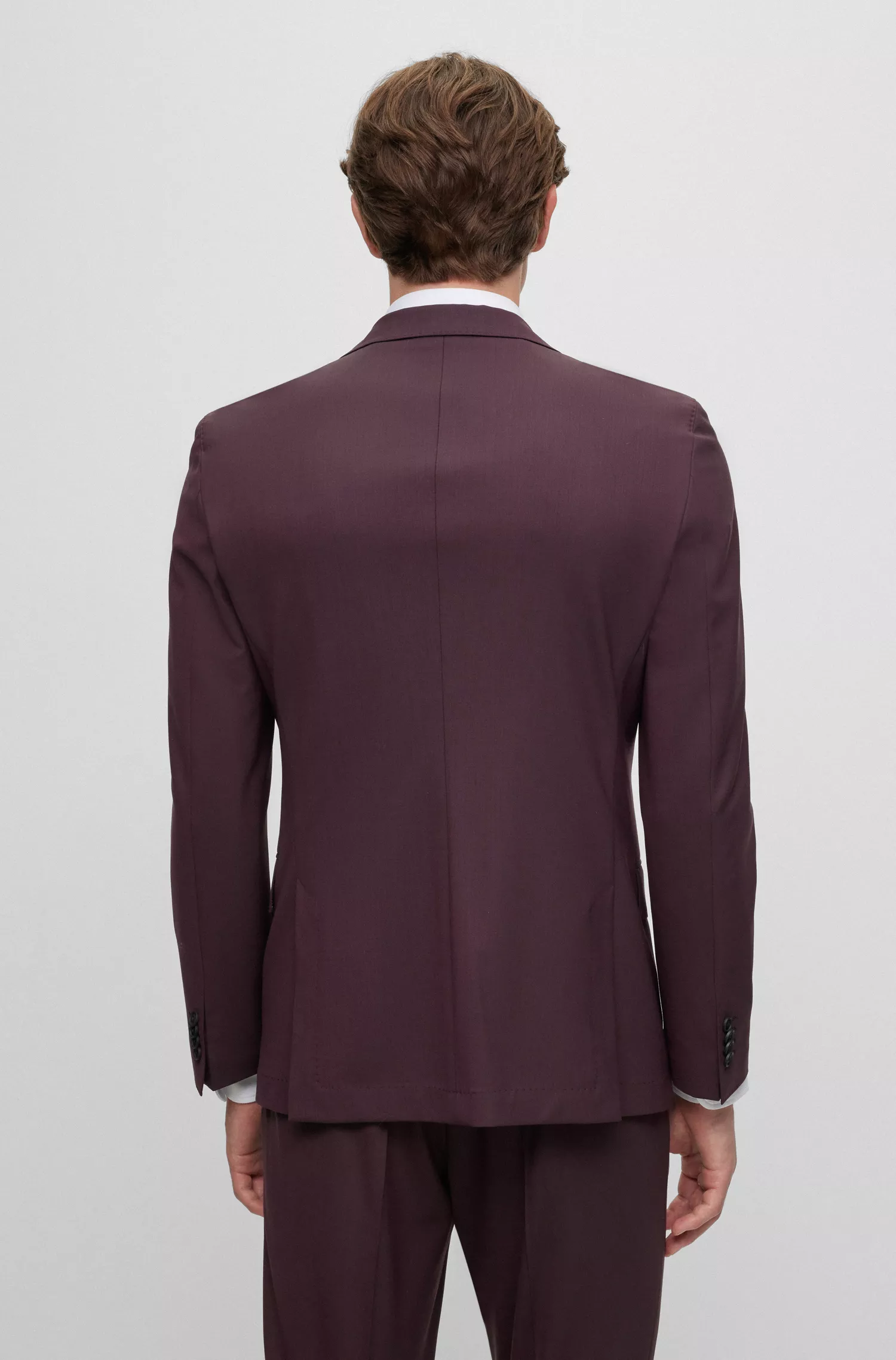 Terno BOSS preto slim fit em lã mesclada elástica.