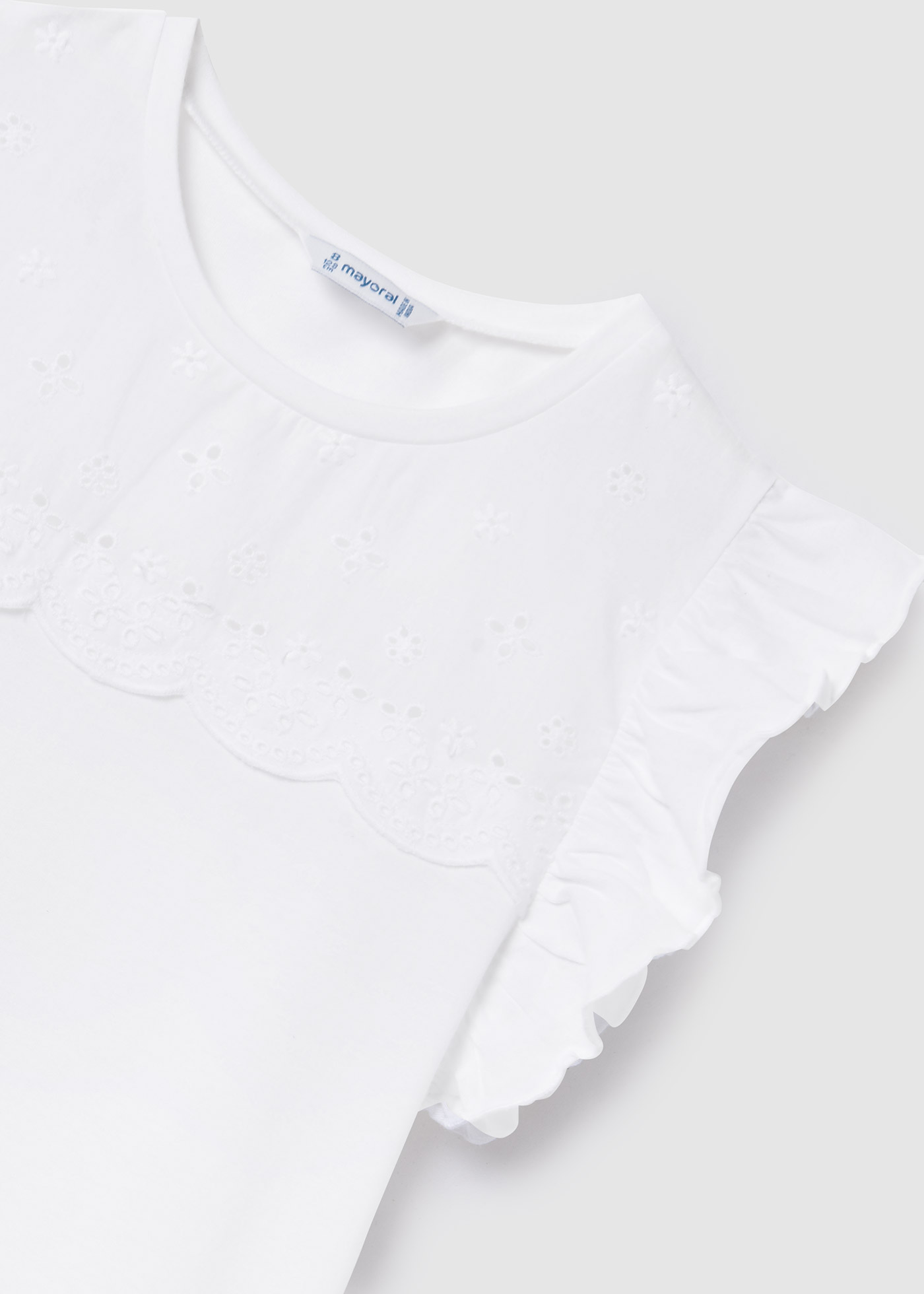 Camiseta regata feminina com babados, feita de algodão sustentável.