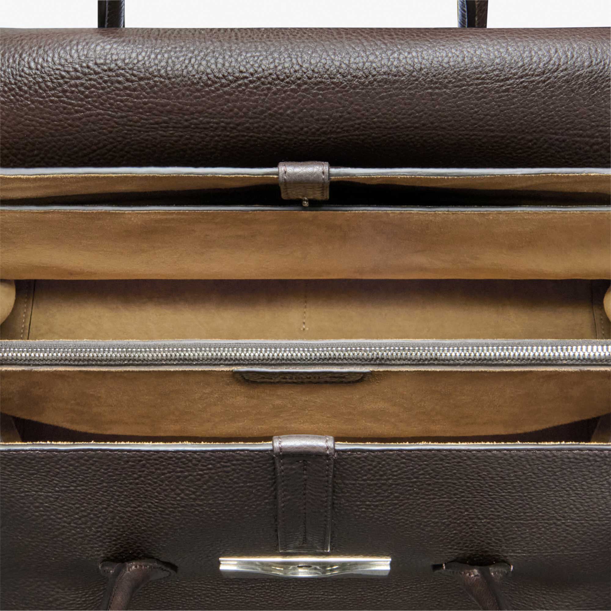 Sac De Voyage B Volute Croisee En Cuir