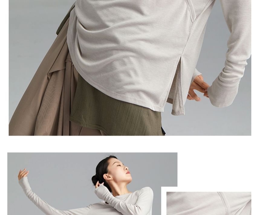 Cossita - Asymmetrische danstop met lange mouwen en ronde hals