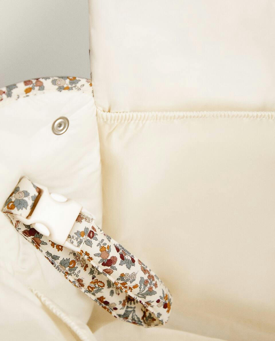 Bolsa de maternidade infantil em tecido com estampa floral