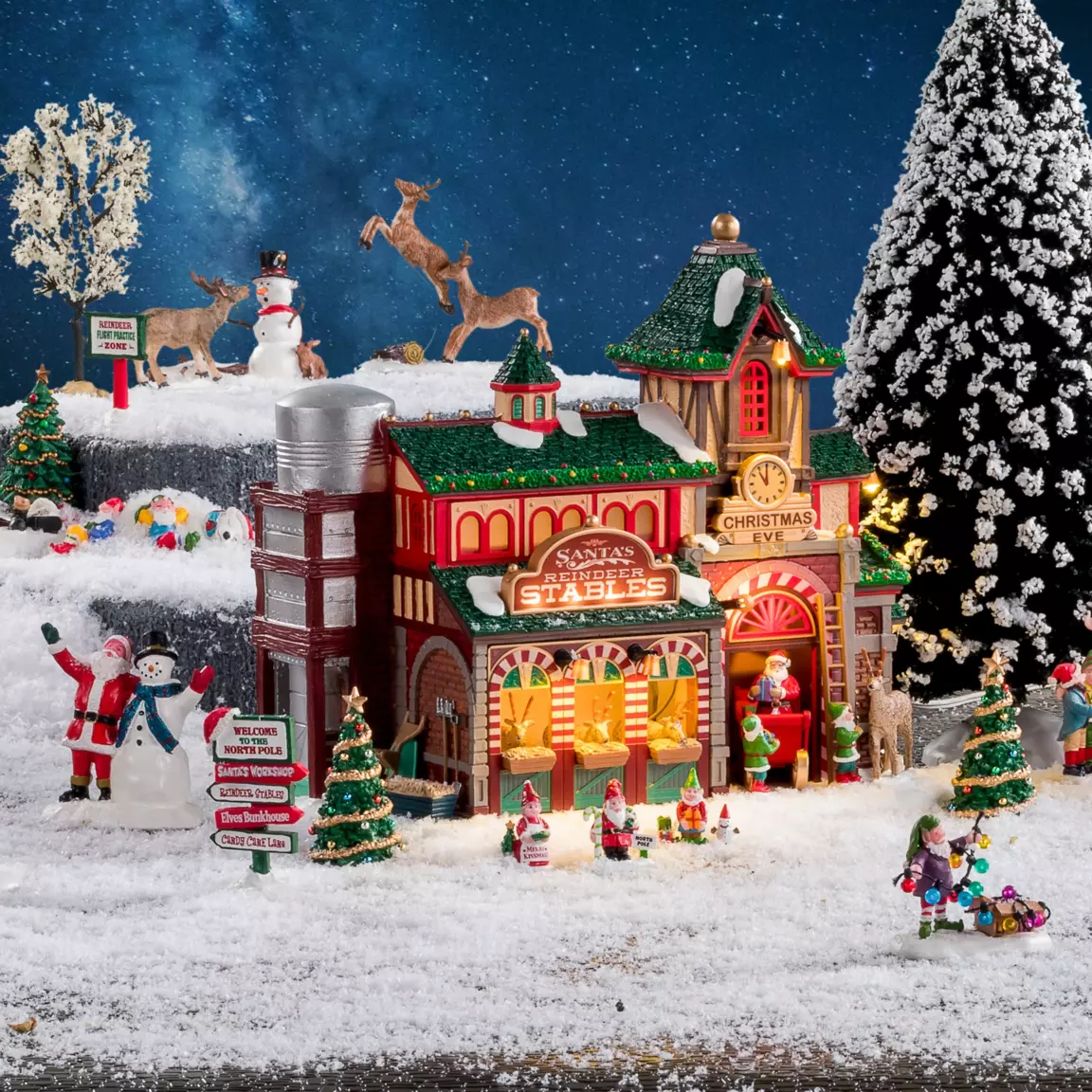Village de Noël Lemax à piles lumineux L'écurie des rennes du Père Noël