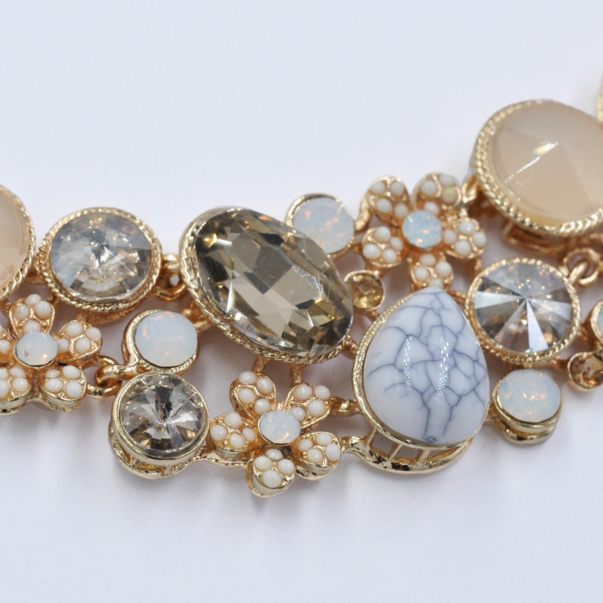 Steuer Modeschmuck Collierkette Metall Mittelteil Blütenzierde gold/kristall/champagner