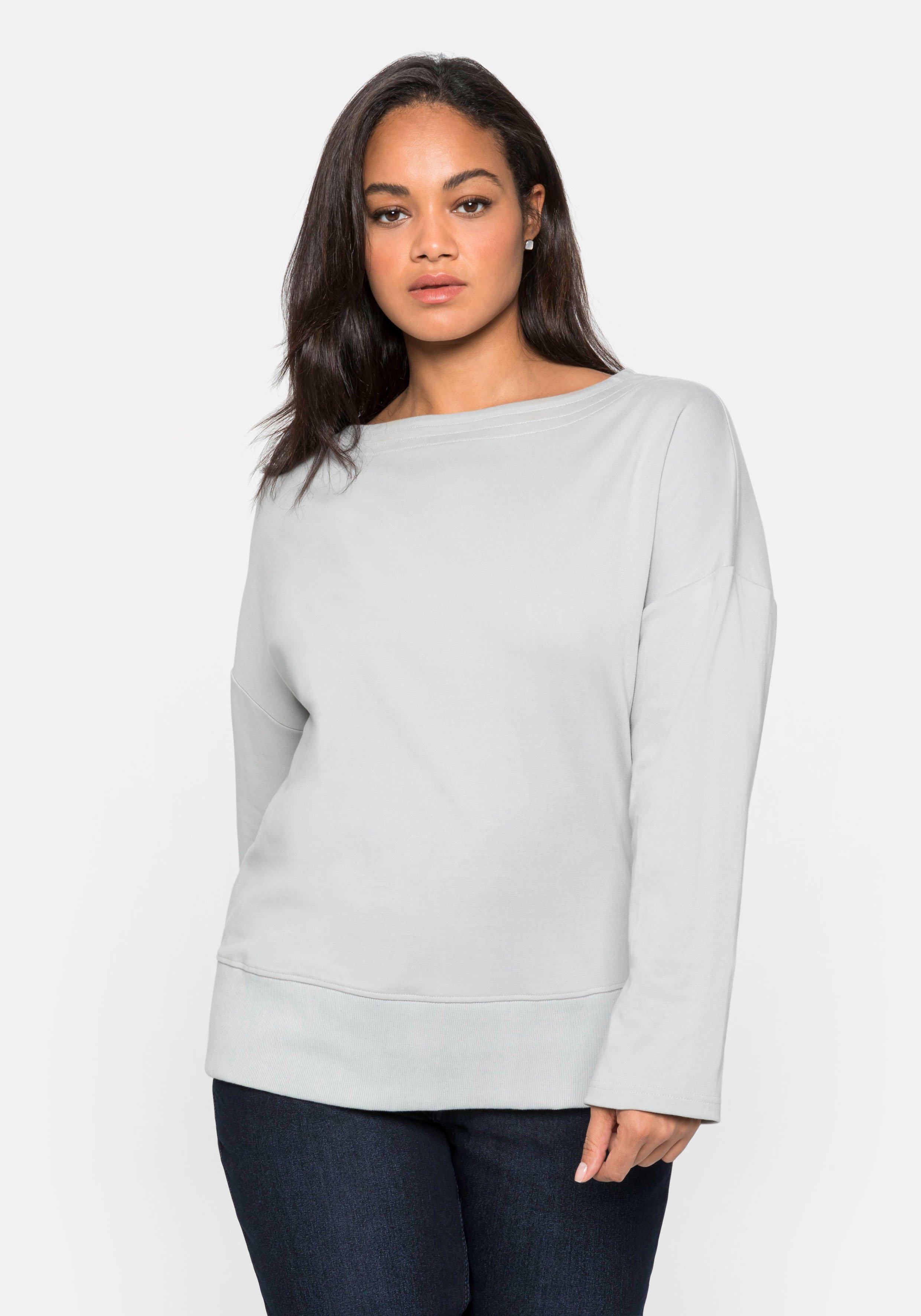 Langarmshirt mit Rippbund am Saum und Ziernähten