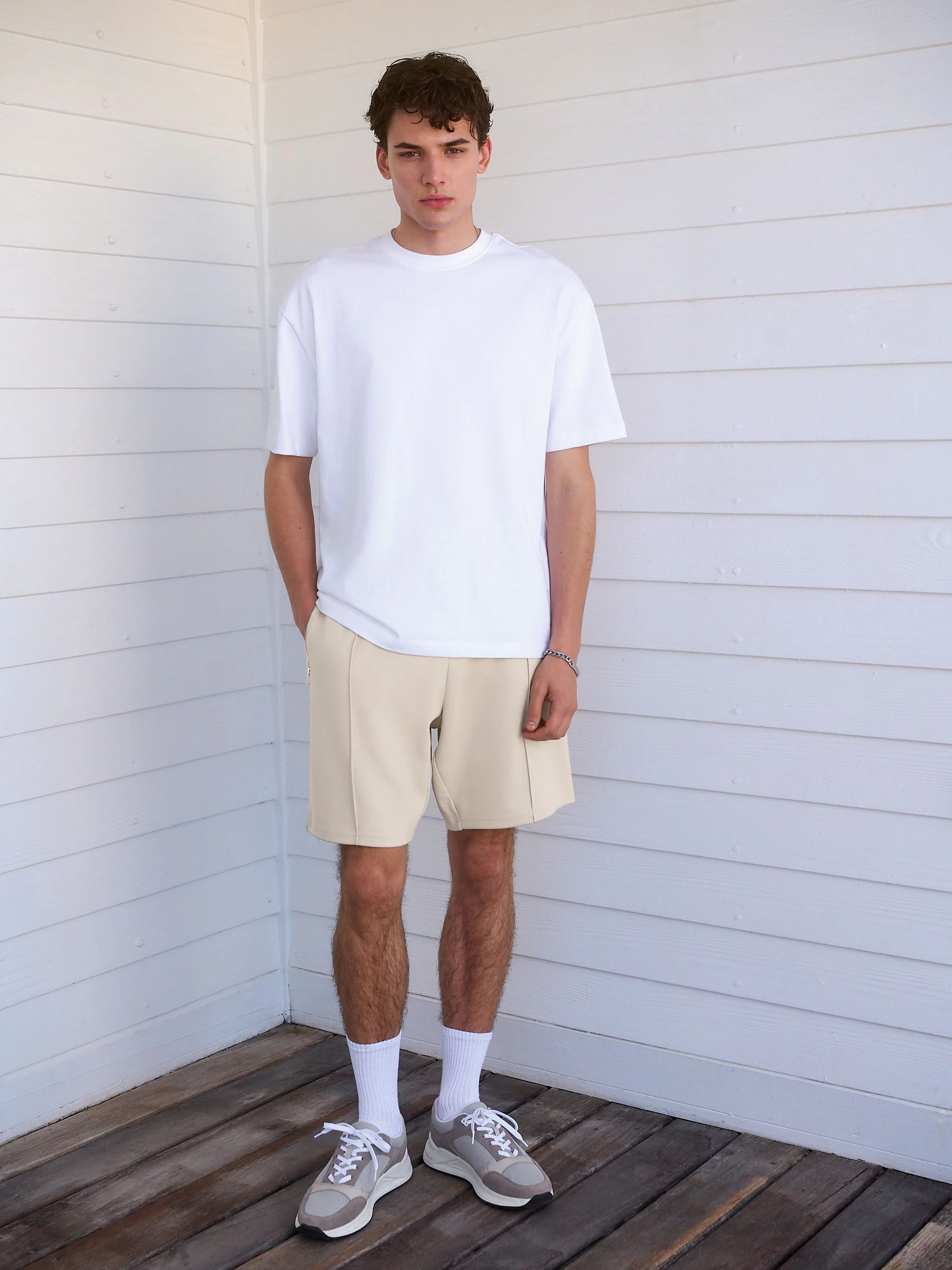Pastelgeel - Slim-fit jersey shorts met slimme ritszakken