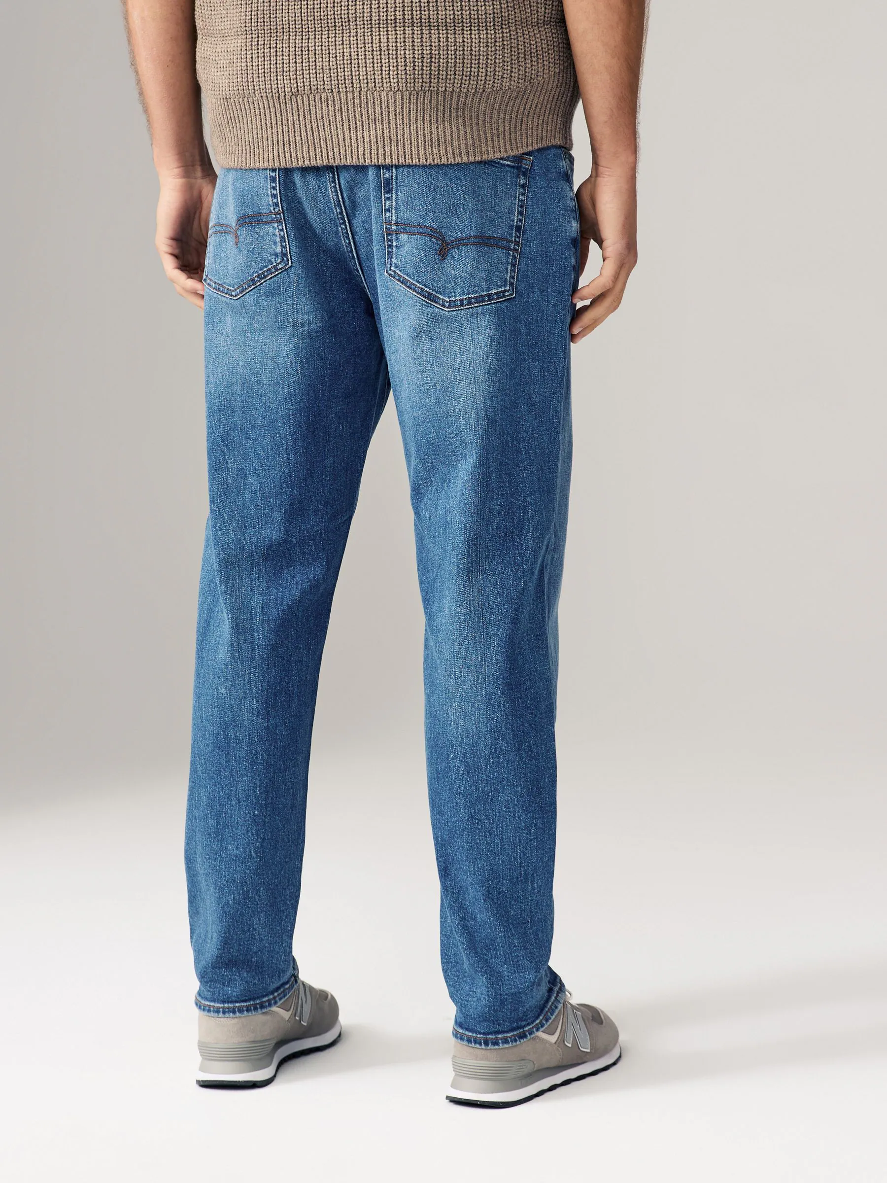 Mediumblauw - Standaard toelopende pasvorm - Vintage wash denim jeans