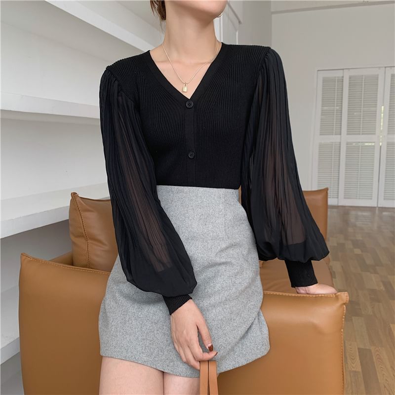 Cassidy - Geribbeld vest met ballonmouwen en V-hals, effen paneel