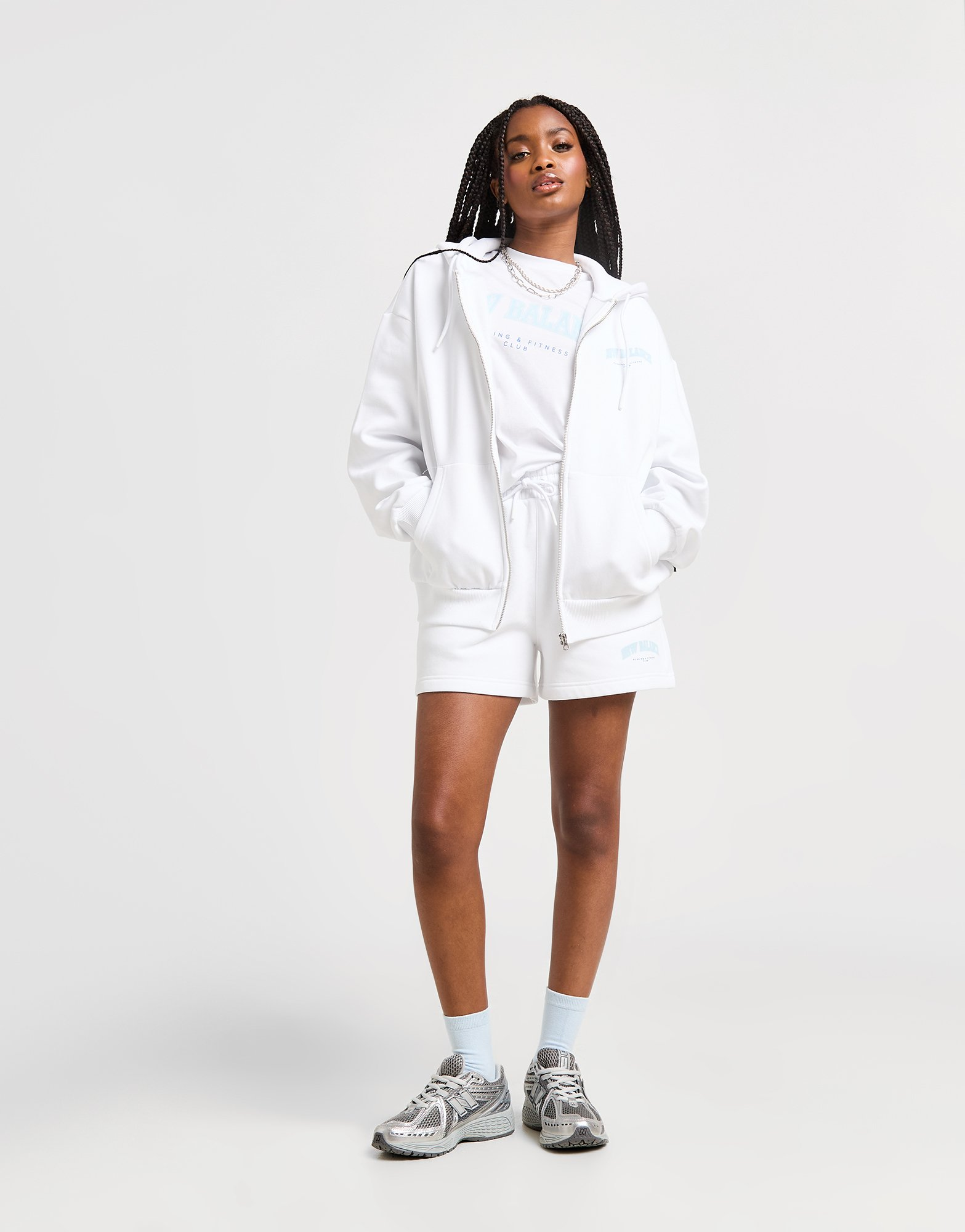 New Balance Sweat à Capuche Zippé Logo Femme
