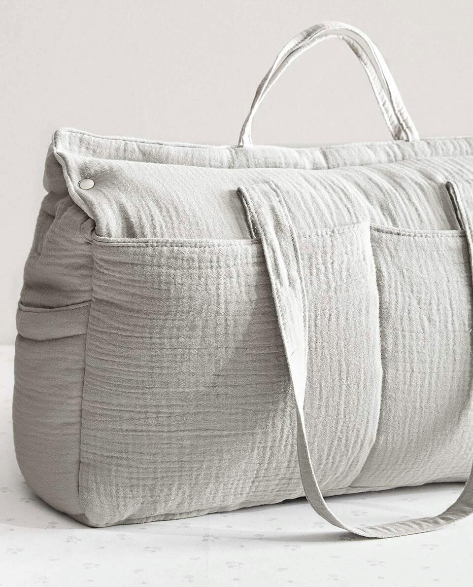 BOLSA DE MATERNIDADE COM ESTAMPA DE TREVO