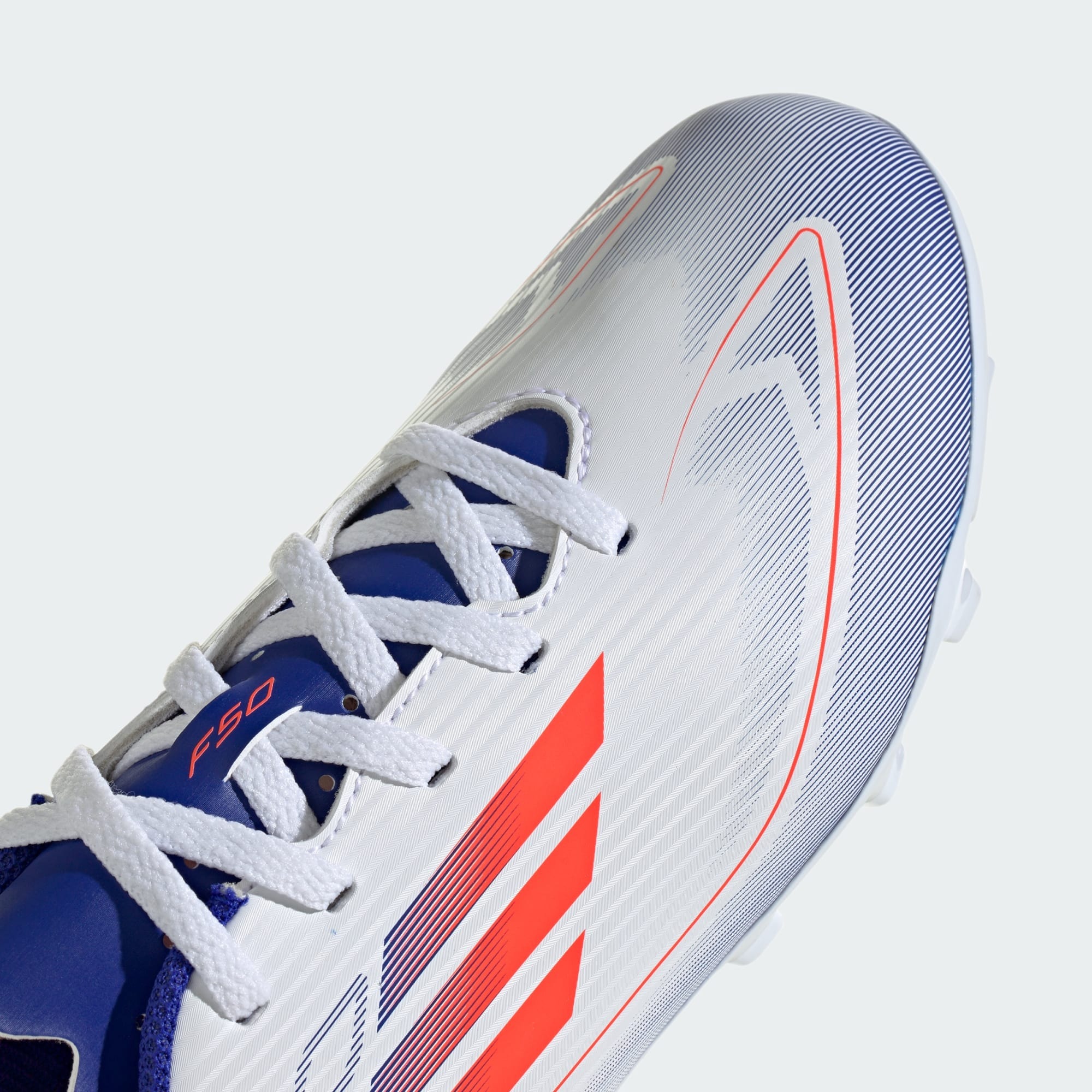 F50 Club FxG Junior Cloud White/Solar Red/Lucid Blue