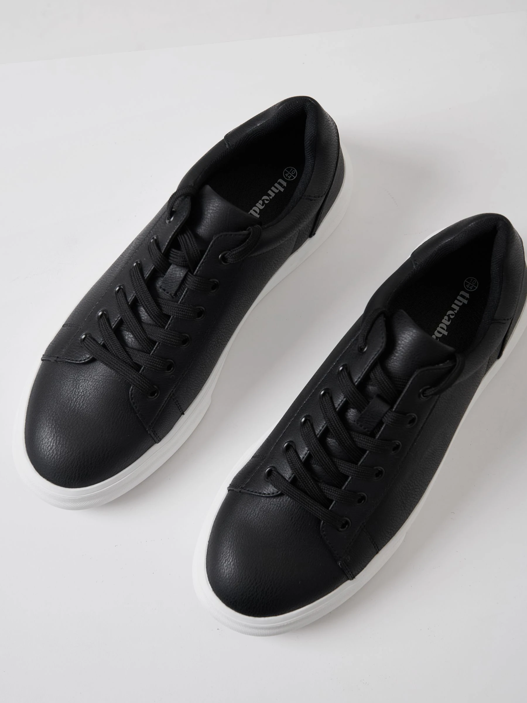 Threadbare Court Trainers