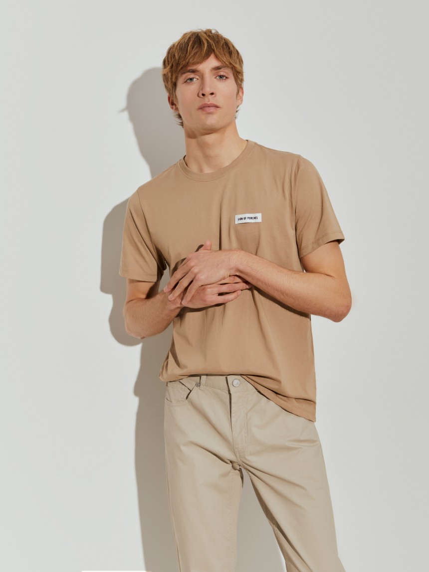 Calças regular fit com cinco bolsos