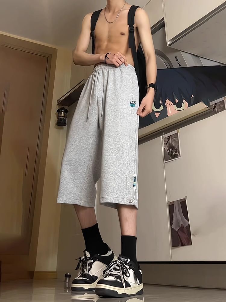 Posive - Capri-joggingbroek met trekkoord in de taille en applicatie
