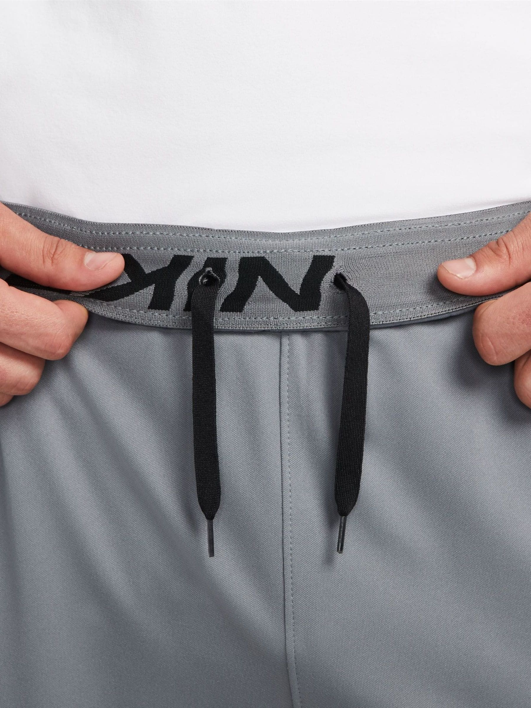 Rookgrijs - Nike Dri-FIT Totality trainingsbroek met taps toelopende pijpen