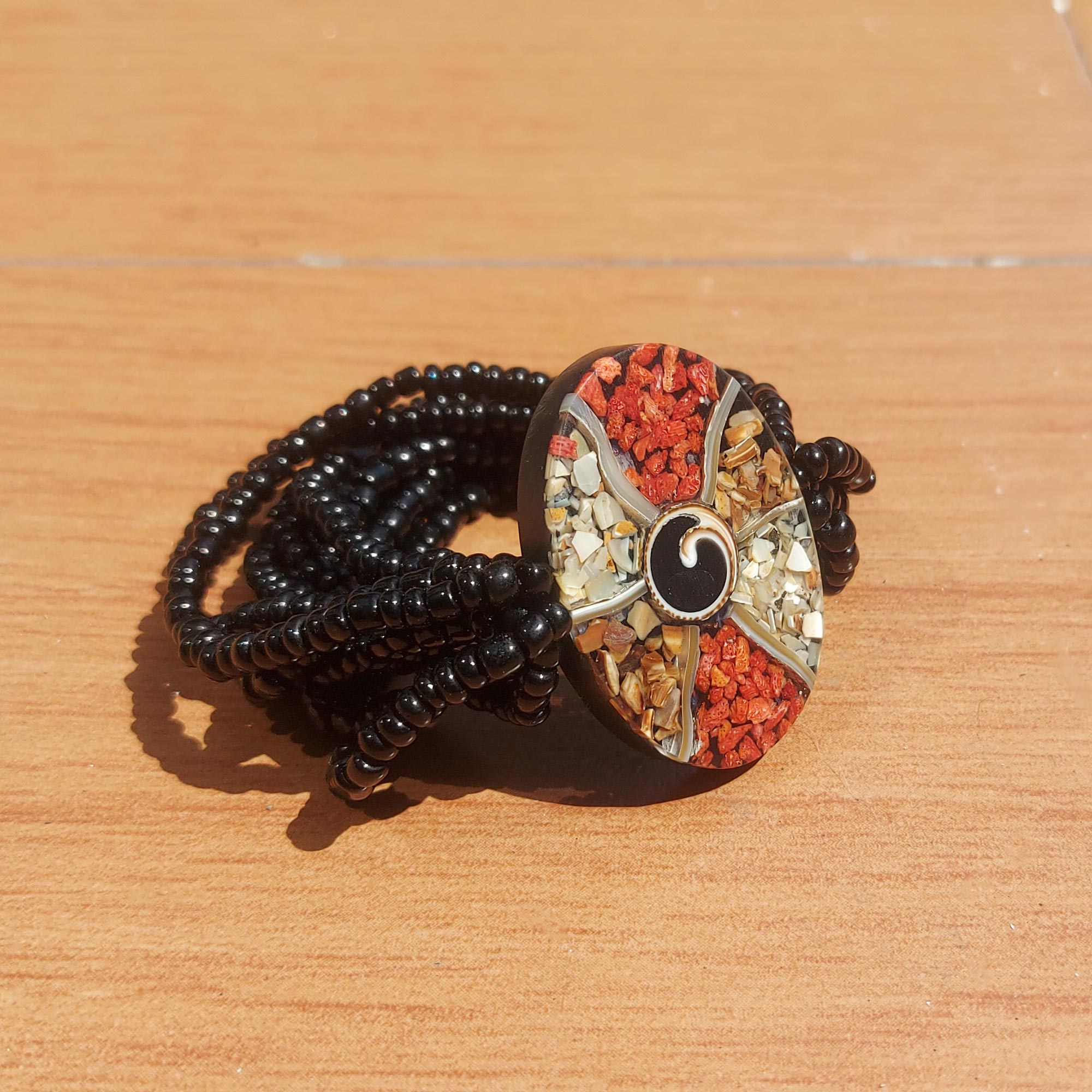 Armband mit Muschel-Emblem, schwarz, multicolor günstig bestellen