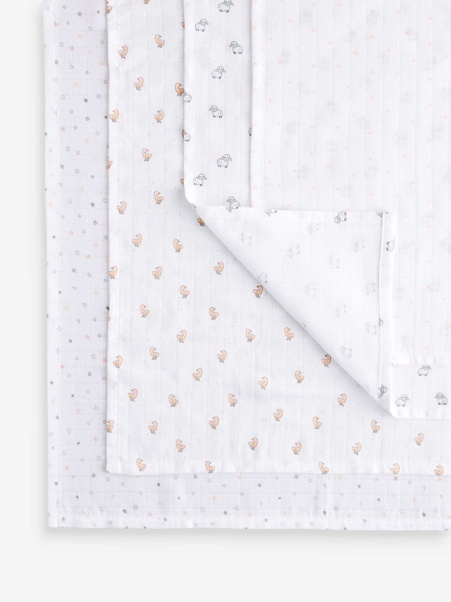 Wit met subtiele dierenprint - Set van 4 mousseline babydoekjes