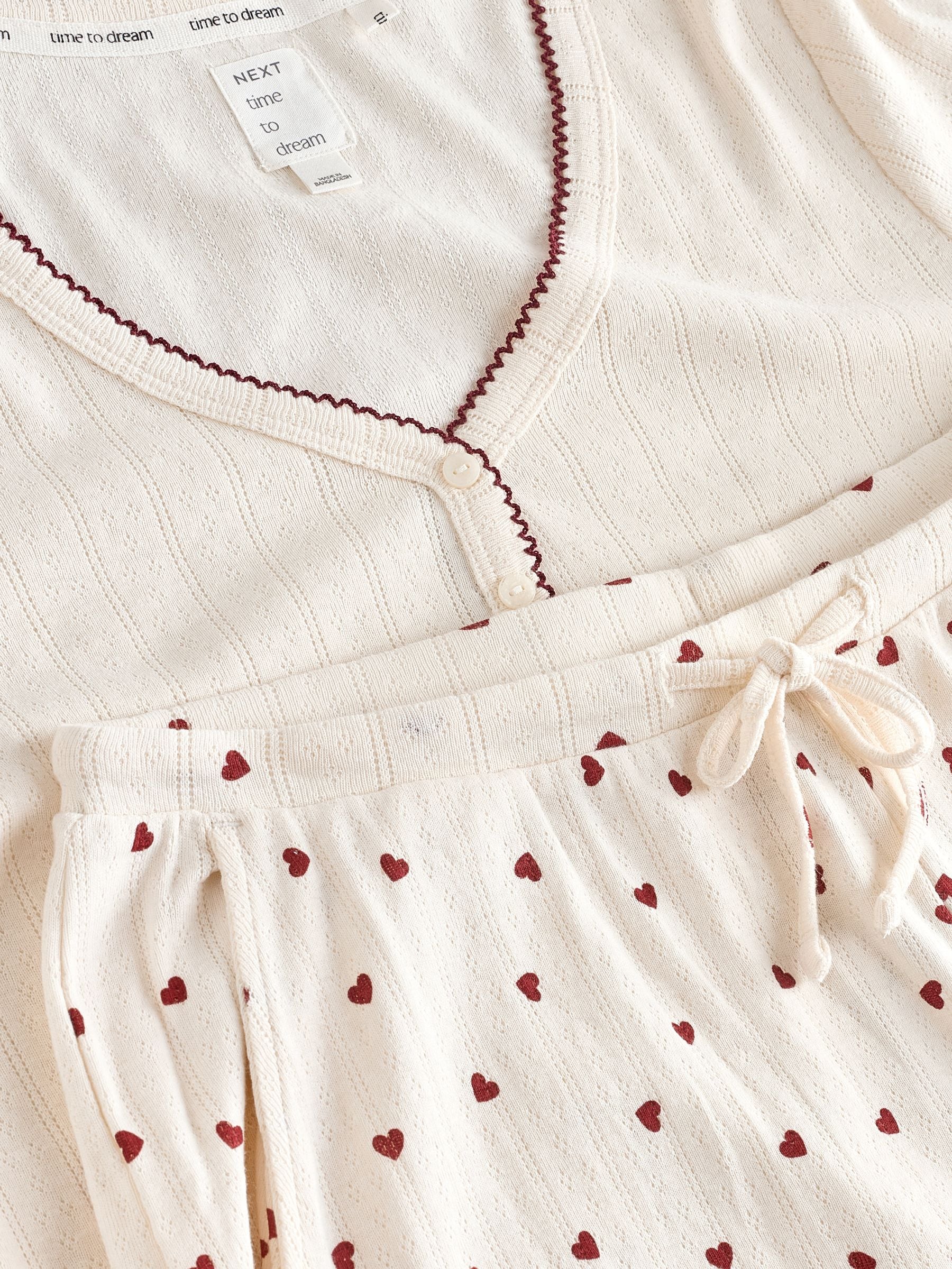 Crème met hartprint - Pointelle pyjama met lange mouwen