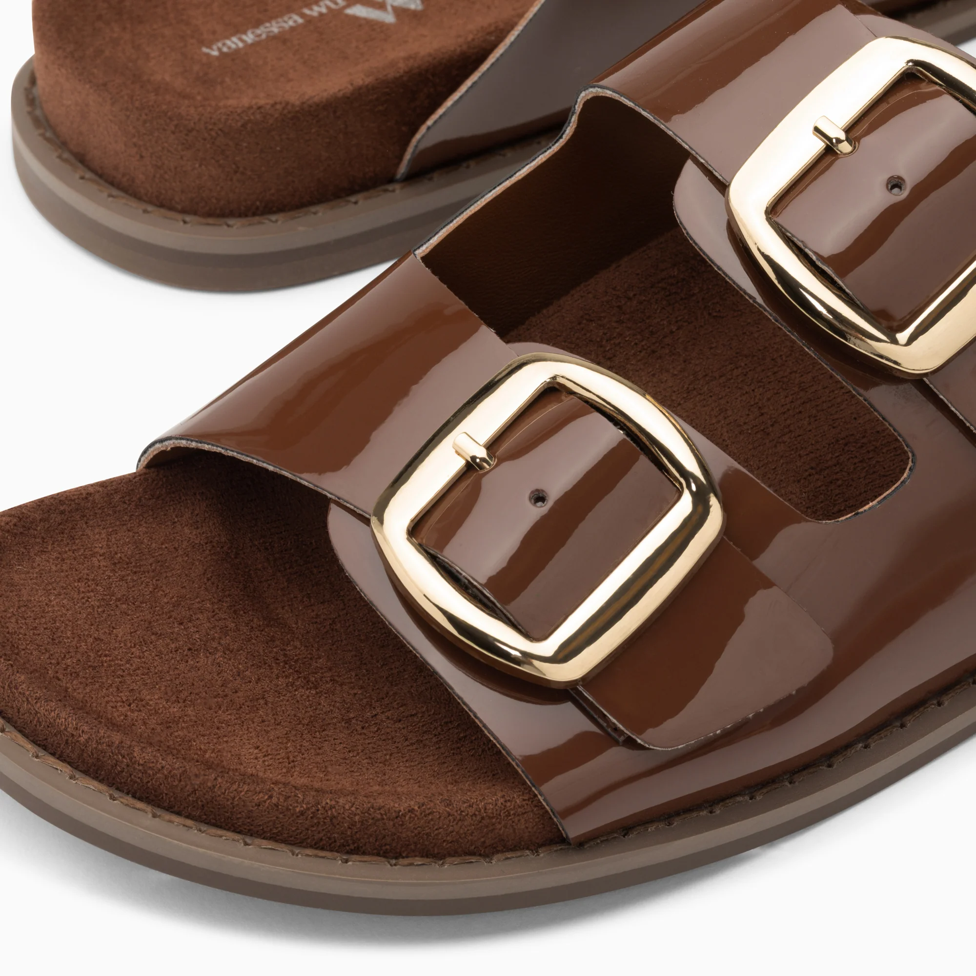 Sandales plates-Mules plates Célia marron verni à boucles oversize