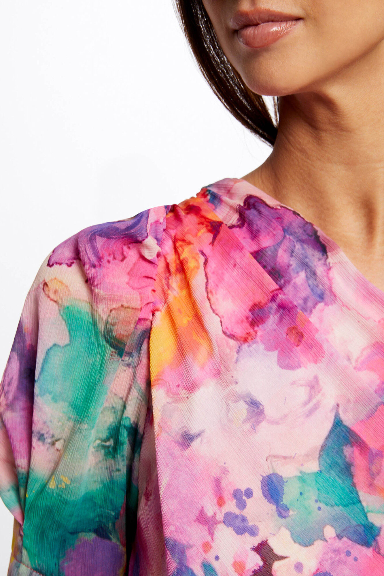 Blusa assimétrica com estampa floral - Multicolorida