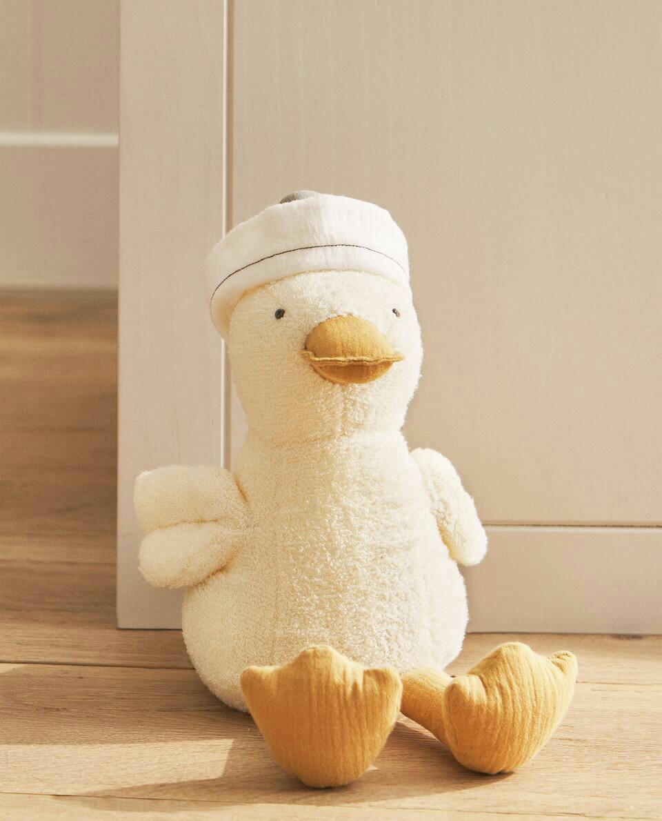 BATENTE DE PORTA EM FORMATO DE PATO