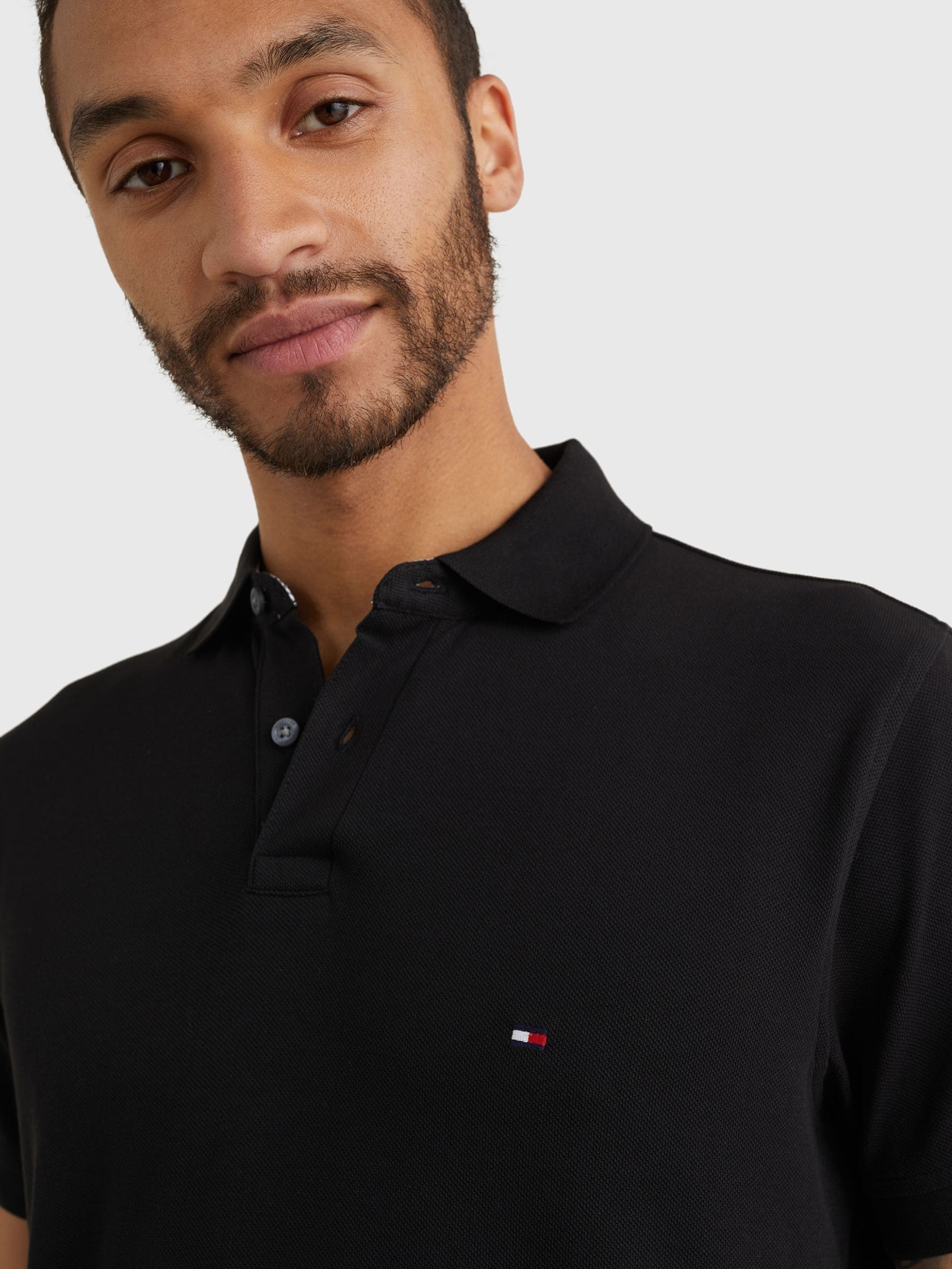 Zwart - Tommy Hilfiger 1985 piqué poloshirt met standaard pasvorm