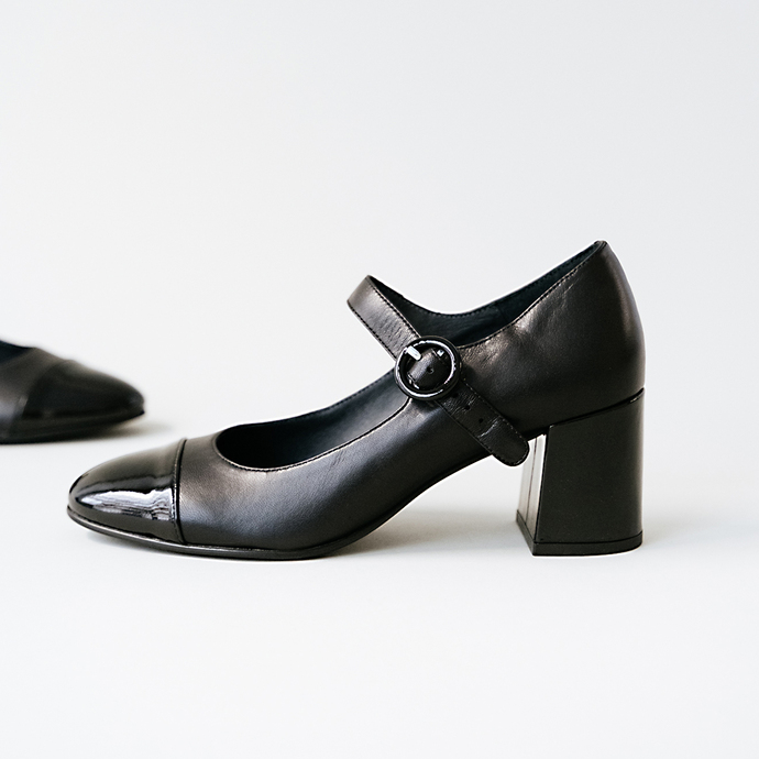 Babies à talons  en vernis et cuir noir