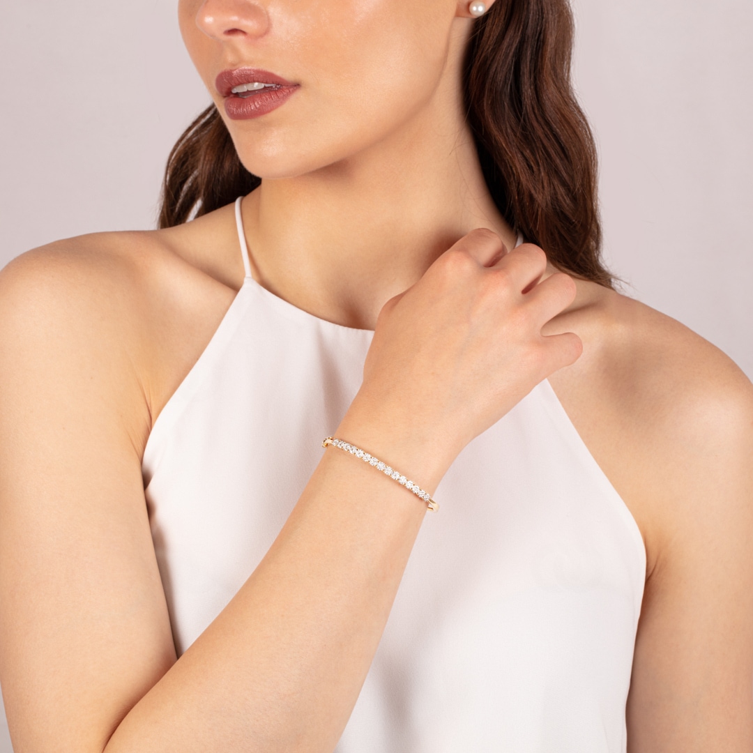 Armreif 750/18 K Gelbgold mit Diamanten 0.78 ct H/si